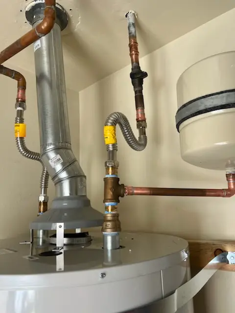 Water heater installation and plumbing repair in Ayer